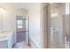 Bathroom featuring a tiled shower, soaking tub, and double vanity sinks at 2054 Van Buren Rd, Sherrills Ford, NC 28673