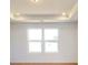 Bright bedroom with a tray ceiling, recessed lighting, and two large windows at 2054 Van Buren Rd, Sherrills Ford, NC 28673