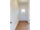 Bright entryway with wood-look flooring and a white front door with decorative window insert at 2054 Van Buren Rd, Sherrills Ford, NC 28673