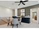 Upstairs dining area with grey accent wall, modern cabinets, and seating for four at 139 Armstrong Rd, Belmont, NC 28012