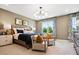 Cozy main bedroom suite with decorative lighting, furnishings, and plenty of natural light at 139 Armstrong Rd, Belmont, NC 28012