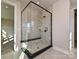 Bathroom with a modern walk-in shower that features a glass enclosure and tiled walls at 139 Armstrong Rd, Belmont, NC 28012