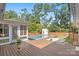 Large backyard with a swimming pool and spacious deck at 1626 S Wendover Rd, Charlotte, NC 28211