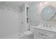 Charming bathroom with floral wallpaper and a white vanity at 1626 S Wendover Rd, Charlotte, NC 28211