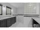 Elegant bathroom with granite countertops and black cabinets at 1626 S Wendover Rd, Charlotte, NC 28211