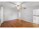 Hardwood floor bedroom with neutral walls and closet at 1626 S Wendover Rd, Charlotte, NC 28211