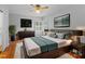 Spacious bedroom with hardwood floors and large windows at 1626 S Wendover Rd, Charlotte, NC 28211
