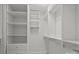 Large walk-in closet with ample shelving and hanging space at 1626 S Wendover Rd, Charlotte, NC 28211