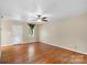 Living room featuring hardwood floors and neutral walls at 1626 S Wendover Rd, Charlotte, NC 28211