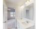 Double vanity bathroom with a view into a bedroom at 2070 Van Buren Rd, Sherrills Ford, NC 28673