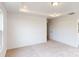 Spacious bedroom with plush carpeting and an adjacent door at 2070 Van Buren Rd, Sherrills Ford, NC 28673