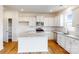 Modern kitchen with white cabinets, granite countertops, and stainless steel appliances at 2070 Van Buren Rd, Sherrills Ford, NC 28673
