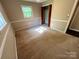 Bedroom with natural light, comfortable carpeting and a spacious closet for ample storage at 1111 S Skyland Dr, Mount Pleasant, NC 28124