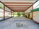A covered parking area or carport with concrete floor at 12770 Bringle Ferry Rd, Richfield, NC 28137