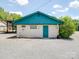 Exterior view of home with blue trim and gravel driveway at 12770 Bringle Ferry Rd, Richfield, NC 28137