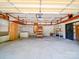 Spacious garage interior with concrete flooring, shelving, and ample storage space at 12770 Bringle Ferry Rd, Richfield, NC 28137