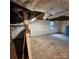 Unfinished basement with exposed pipes and window at 705 Neil St, Gastonia, NC 28052