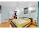 Bright bedroom with hardwood floors, fan and closet at 640 Davie Ave, Statesville, NC 28677