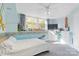 This bedroom is decorated with an aquatic theme, a large window, and carpeted flooring at 640 Davie Ave, Statesville, NC 28677