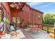 Outdoor deck with colorful seating, grill, and charming decorations, perfect for entertaining at 640 Davie Ave, Statesville, NC 28677