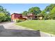 Beautiful modern home with a two-car garage, brick accents, and an expansive front yard, great for curb appeal at 640 Davie Ave, Statesville, NC 28677