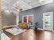 Bright and airy living room with a coffered ceiling, fireplace, and access to the deck at 640 Davie Ave, Statesville, NC 28677