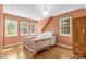 Bedroom with hardwood floors and neutral wall colors at 7507 Waxhaw Creek Rd, Waxhaw, NC 28173