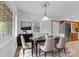Bright dining area with table and chairs near kitchen at 7507 Waxhaw Creek Rd, Waxhaw, NC 28173