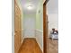 Hardwood floor entryway with light walls and access to other rooms at 7507 Waxhaw Creek Rd, Waxhaw, NC 28173