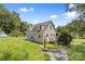 House exterior showcasing a charming design and well-maintained lawn at 7507 Waxhaw Creek Rd, Waxhaw, NC 28173