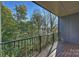 Private balcony offering scenic woodland views at 112 Frazier Ave, Charlotte, NC 28216