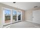 Bright bedroom with access to a private balcony and city views at 112 Frazier Ave, Charlotte, NC 28216