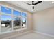 Well-lit bedroom with large windows and ceiling fan at 112 Frazier Ave, Charlotte, NC 28216