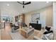 Light and airy living room with ceiling fan and stylish furniture at 112 Frazier Ave, Charlotte, NC 28216