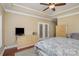 Spacious bedroom with ceiling fan, hardwood floors, and French doors at 556 Peaceful Creek Dr, York, SC 29745