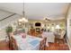 Dining area with hardwood floors and open concept to living room at 556 Peaceful Creek Dr, York, SC 29745