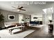 Modern dining area features a long wooden table, benches, and a stylish rug at 556 Peaceful Creek Dr, York, SC 29745