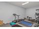 Basement home gym with treadmill and weight machine at 556 Peaceful Creek Dr, York, SC 29745