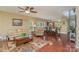 Open living area with hardwood floors and views into kitchen and dining areas at 556 Peaceful Creek Dr, York, SC 29745