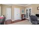 Home office with built-in shelving and french doors at 556 Peaceful Creek Dr, York, SC 29745