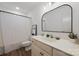 Updated bathroom with white vanity, black framed mirror, and shower/tub combo at 35 Old Post Rd, Clover, SC 29710