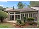 Back exterior view of the property, showing a private patio and landscaping at 35 Old Post Rd, Clover, SC 29710