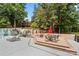 Spacious pool deck with tables and chairs for relaxing at 35 Old Post Rd, Clover, SC 29710