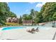 Community pool with lounge chairs and surrounding landscaping at 35 Old Post Rd, Clover, SC 29710