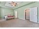 Bright bedroom with neutral walls and carpet, featuring an ensuite bathroom at 6801 Cinnamon Cir, Mint Hill, NC 28227