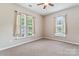 Simple bedroom with neutral walls and carpet flooring at 6801 Cinnamon Cir, Mint Hill, NC 28227