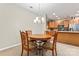 Bright dining area with four chairs and kitchen views at 6801 Cinnamon Cir, Mint Hill, NC 28227