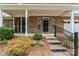 House exterior with brick facade, porch, and steps at 6801 Cinnamon Cir, Mint Hill, NC 28227