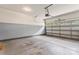 Attached garage with open overhead door and ample space at 6801 Cinnamon Cir, Mint Hill, NC 28227