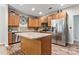 Modern kitchen with stainless steel appliances and an island at 6801 Cinnamon Cir, Mint Hill, NC 28227